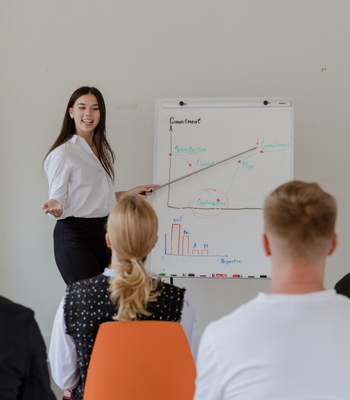 Strategic workforce planning session with HR advisor and business owner
